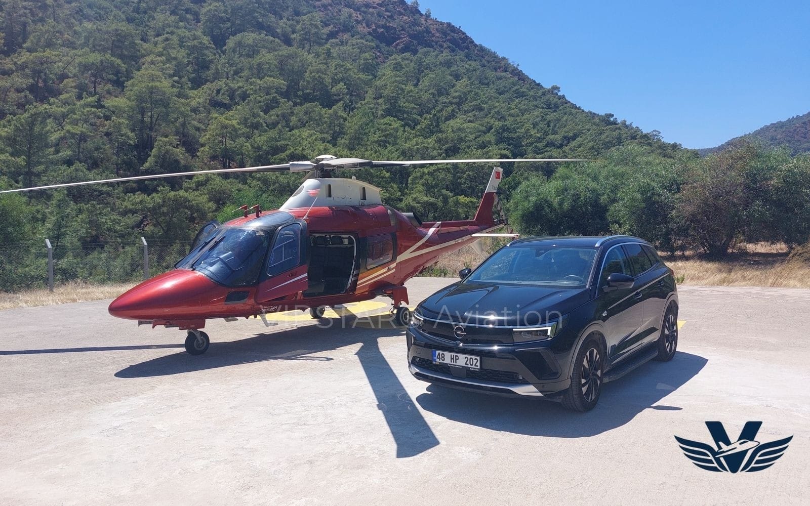 Airbus H145 helicopter landing on a luxury yacht helipad in Gocek