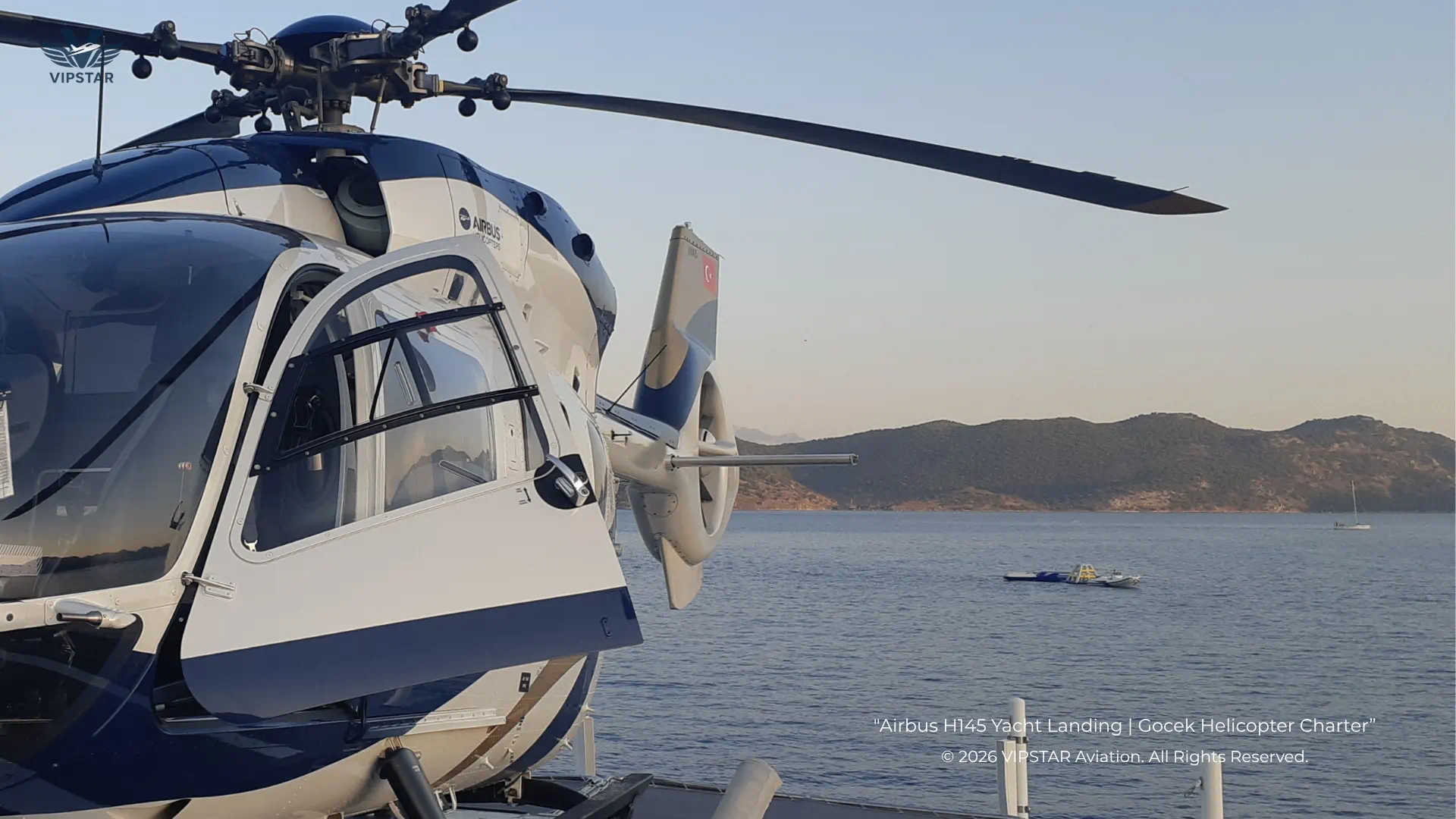 Gocek Helicopter Yacht Transfer – VIPSTAR® Aviation Airbus H145 helicopter landing on a private yacht deck for Gocek helicopter charter and transfer