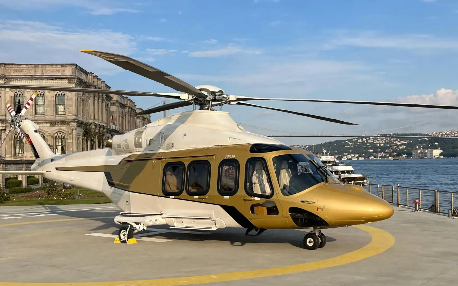 Ciragan Palace Kempinski Helipad AW139 Bosphorus Helicopter Transfer | VIPSTAR Aviation AW139 helicopter on Ciragan Palace Kempinski helipad Bosphorus Istanbul