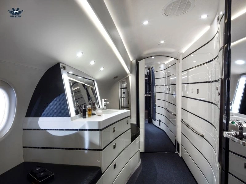 Dassault Falcon 8X private aft VIP lavatory with stand-up shower